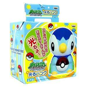   Diamond & Pearl Piplup Light Up Action Coin Bank 45195: Toys & Games