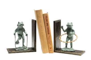   verdi frogs playing bookends make a whimsical addition to any decor