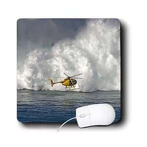  Waves Surf   A helicopter hovers in front of 60 foot surf crashing 