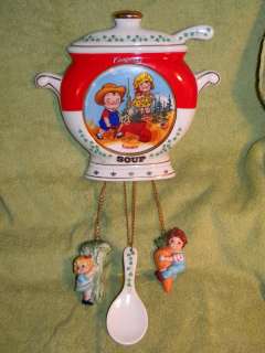   MINT PORCELAIN CAMPBELLS SOUP CLOCK BATTERY OPERATED W/ WEIGHTS  