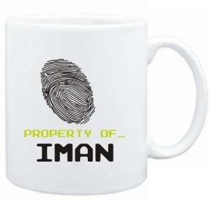  Mug White  Property of _ Iman   Fingerprint  Female 