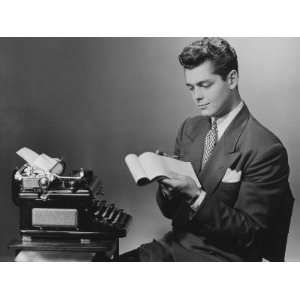  Man Sitting at Typewriter, Reading Notes Photographic 