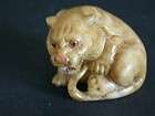 japanese netsuke baby tiger crying for its mommy 