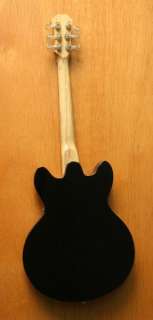   Guitar, a Gibson 350 Style replica in 3 tone sunburstfinish