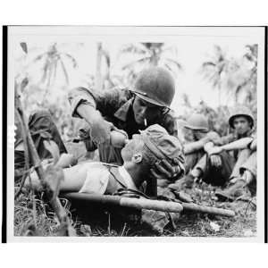  Navy gives drink to wounded marine on Guam 1944,WW II 