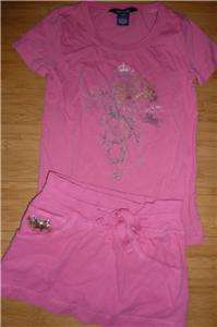 Darling pink mini skirt with shorts built in underneath and matching 
