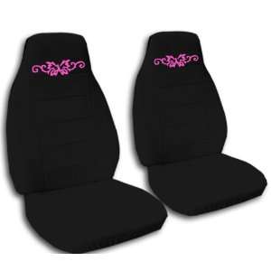  2 black car seat covers, with a butterfly tattoo for a 