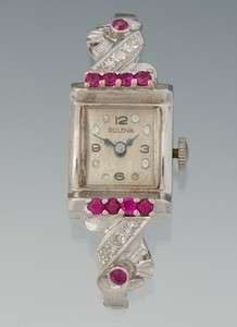 14K Bulova Watch Adorned With Rubies and Diamonds band is gold filled 