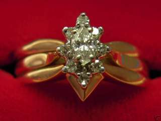 Cluster marquis cut engagement ring n two wedding bands  