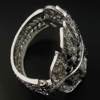   Antique style silver tone black leaf shaped iron spring charm bracelet