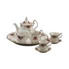oz teapot sugar creamer and four teacups with matching saucers 