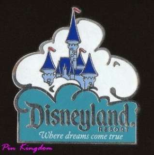 pin features the disneyland castle sticking out of a big