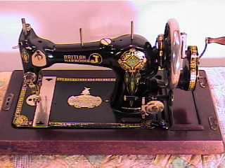 up for sale is a british harrodia hand crank sewing machine that