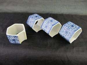 Lot of 4 Blue and White Floral Porcelain Napkin Rings  