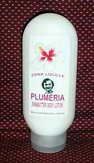 this is a 8 oz plastic bottle of edna lucille sheabutter body lotion 