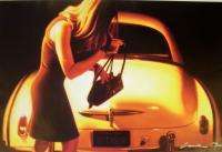  AS SHE SEARCHES HER PURSE FOR THE KEYS TO HER BEAUTIFUL CLASSIC CAR 
