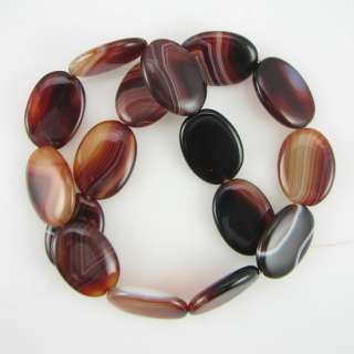 Brazilian agate flat oval beads. This strand is 16 long, about 