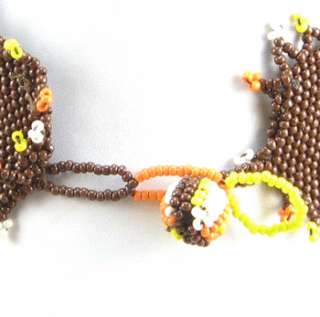 BROWN ORANGE WHITE SEED BEADED EAGLE CHOKER NECKLACE  