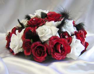 These lovely round centerpiece are made with white roses, red roses 